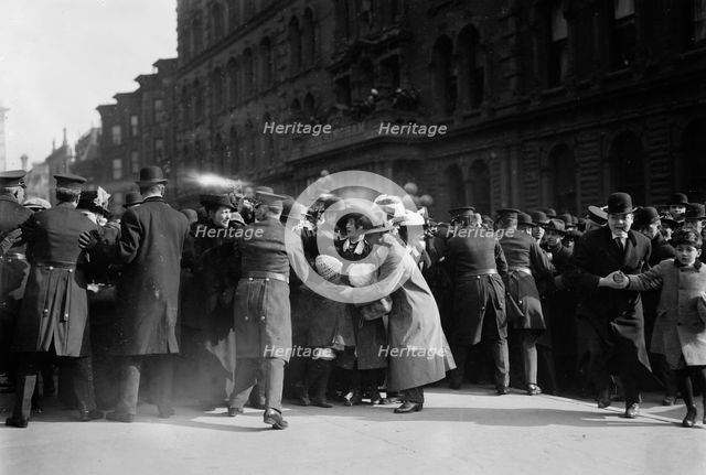 Police keeping crowd back, St. Patricks Day, 1913. Creator: Bain News Service.