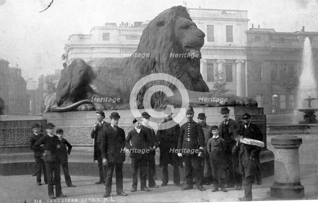 Policeman and men, Trafalgar Square, Westminster, London, late 19th-early 20th century. Creator: Unknown.