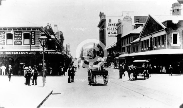 Policeman directs traffic at the intersection of Queen and Edward St, Brisbane, Queensland, c1908. Creator: Unknown.