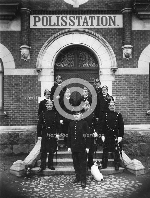 Policemen pose in front of the police station, Trelleborg, Sweden, 1899. Creator: Unknown.