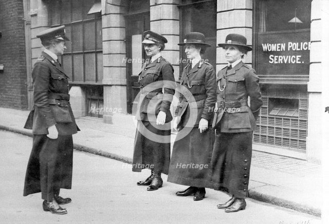 Policewomen being inspected by Mary S Allen in London, May 1915. Creator: Unknown.