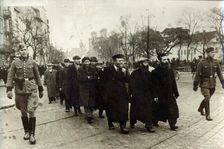 Polish Jews being escorted by German soldiers and Gestapo, Poland, March 1940