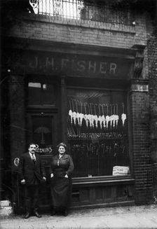 Polish Jews outside their umbrella shop in Hackney, London, c1910. Creator: Unknown