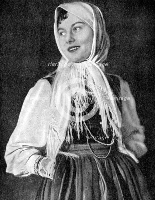Polish woman in traditional dress, 1936. Artist: Unknown