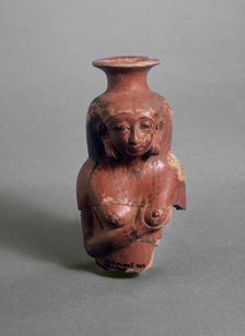 Polished red ware vessel modelled as a nursing woman, XVIIIth Dynasty (c 1540 BC-c1292 BC)