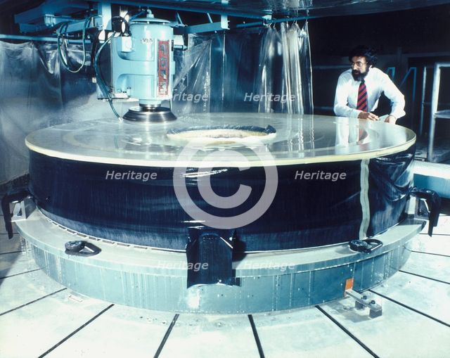 Polishing the mirror of the Hubble Telescope, 1980s. Creator: Unknown.
