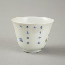 Polychrome and underglaze blue month cup with enamel decoration, 1980s