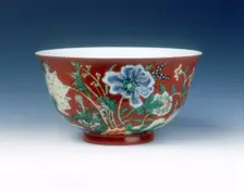 Polychrome bowl with flowers on coral ground, late Kangxi period, Qing dynasty, China, 1700-1722. Creator: Unknown