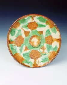 Polychrome dish with moulded decoration, Liao dynasty, China, late 11th century. Creator: Unknown
