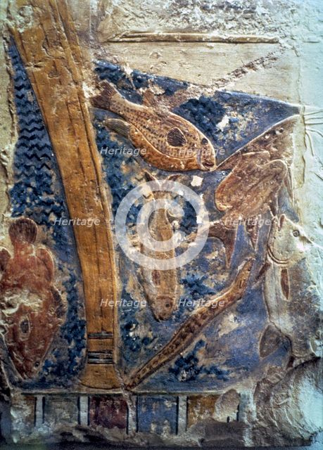 Polychromed marine relief carved and painted on limestone.