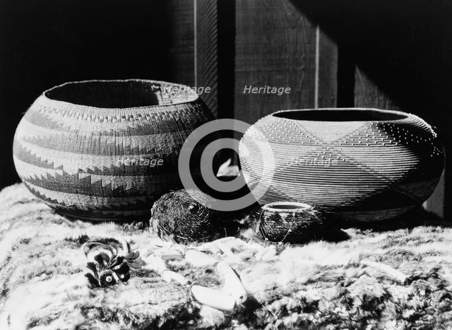 Pomo baskets and magnesite beads, 1924, c1924. Creator: Edward Sheriff Curtis.