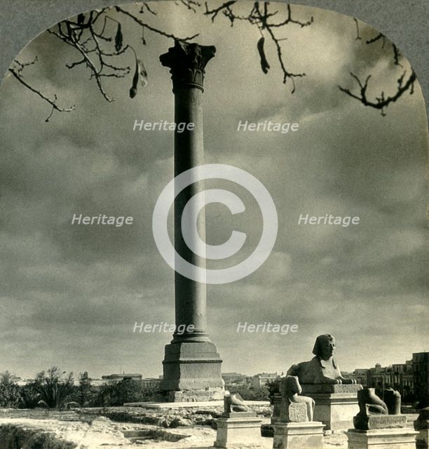 'Pompey's Pillar, a Landmark for Sailors, and Sphinxes (Recently Unearthed), Alexandria, Egypt', c19 Creator: Unknown.