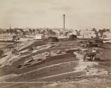 Pompey's Pillar and Arab Village at Alexandria, 19th century. Creator: Maison Bonfils