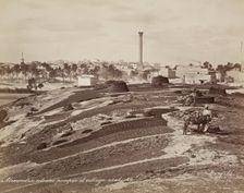 Pompey's Pillar and Arab Village at Alexandria, 19th century. Creator: Maison Bonfils