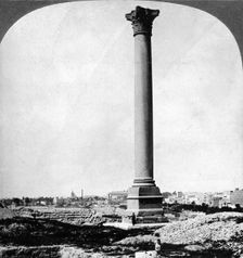 Pompey's Pillar, the sailor's landmark, and modern Alexandria, Egypt 1905.Artist: Underwood & Underwood
