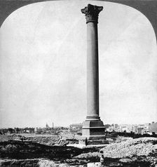 Pompey's Pillar, the sailor's landmark, and modern Alexandria, Egypt 1905.Artist: Underwood & Underwood