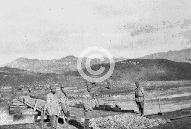 'Pont de bateaux sur la Tcherna pres de Skotchivir', 1916. Creator: Unknown.