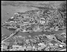Poole Old Town and the waterfront, Poole, 1936. Creator: Aeropictorial Ltd