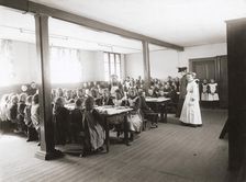 Poor children are served free meals in the refectory, Albano school, Landskrona, Sweden, 1906