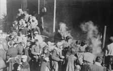 Poor in North France fed from German field kitchen, between c1914 and c1915. Creator: Bain News Service