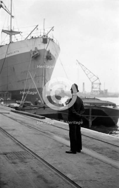 Port of London Authority policeman on patrol, c1945-c1965. Artist: SW Rawlings