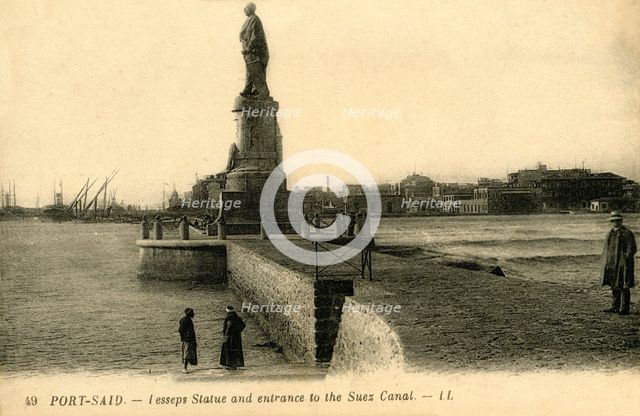 'Port Said. - Lesseps Statue and entrance to the Suez Canal - LL.', c1918-c1939. Creator: Unknown.