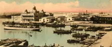 Port Said. - The entrance to the canal and Offices to the Company c1918-c1939. Creator: Unknown