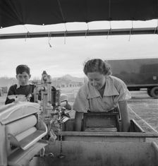 Portable laundry unit, shower unit beyond, FSA camp, Merrill, Oregon, 1939. Creator: Dorothea Lange