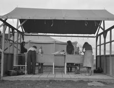 Portable laundry unit, shower unit beyond, FSA camp, Merrill, Oregon, 1939. Creator: Dorothea Lange