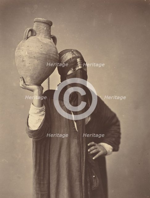 Porteuse d'eau au Caire [Water Carrier in Cairo], c. 1870. Creator: Felix Bonfils.