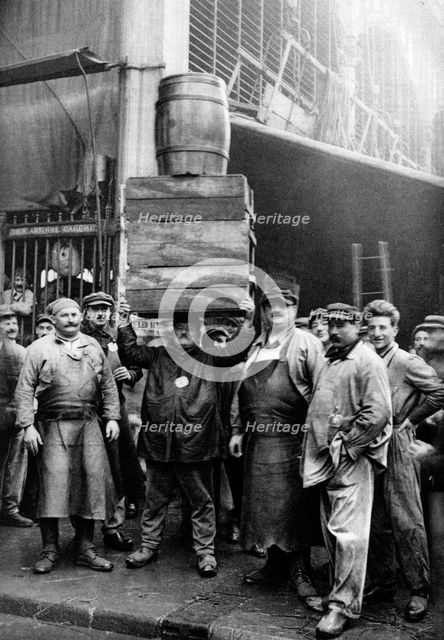 Porters at the Central Market, Paris, 1931.Artist: Ernest Flammarion