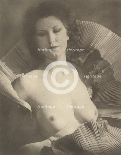 Portrait (Female Nude Draped in Folded Fan-Like Paper), about 1920. Creator: Arthur J Kales.