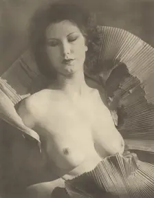 Portrait (Female Nude Draped in Folded Fan-Like Paper), about 1920. Creator: Arthur J Kales