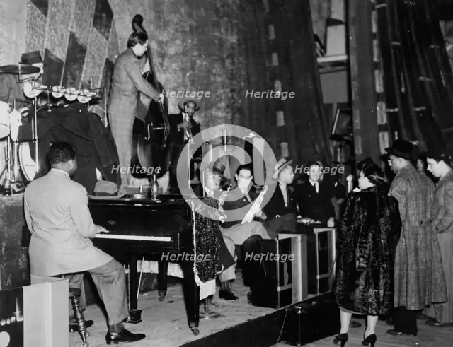Portrait of Count Basie, Ray Bauduc, Bob Haggart, Harry Edison, Herschel Evans...Washington, c1941. Creator: William Paul Gottlieb.
