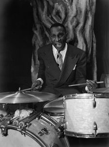 Portrait of Cozy Cole, Ole South, Washington, D.C., 1938. Creator: William Paul Gottlieb