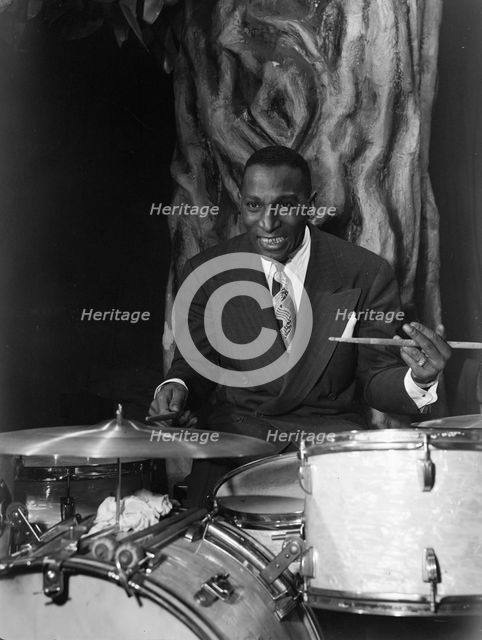 Portrait of Cozy Cole, Ole South, Washington, D.C., 1938. Creator: William Paul Gottlieb.