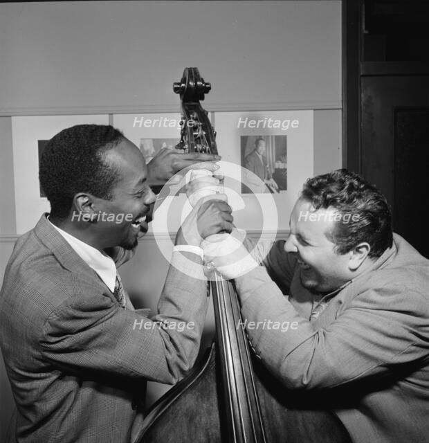 Portrait of Chubby Jackson and John Simmons, William P. Gottlieb's office, N.Y., ca. July 1947. Creator: William Paul Gottlieb.
