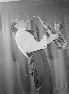 Portrait of Charlie Ventura, William P. Gottlieb's home (table tennis room), N.Y., ca. Apr. 1947. Creator: William Paul Gottlieb