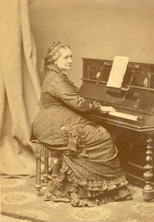 Portrait of Clara Wieck-Schumann (1819-1896) at the piano, ca 1878. Creator: Hanfstaengl, Franz (1804-1877)