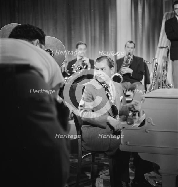 Portrait of Claude Thornhill, Willie Wechsler, Micky Folus, and Joe...Beautiful Doll, N.Y., 1947. Creator: William Paul Gottlieb.