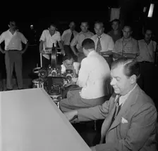 Portrait of Claude Thornhill, Columbia Pictures studio, the making of Beautiful Doll, N.Y., 1947. Creator: William Paul Gottlieb