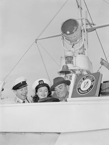 Portrait of Cliff Edwards, Betty Brewer, and Frank...Ukelele Lady (yacht), Hudson River, N.Y., 1947. Creator: William Paul Gottlieb