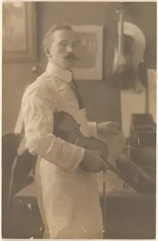 Portrait of a Violin Maker in Studio, 1895-1943. Creator: Louis Fleckenstein