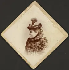 Portrait of a woman, 1889-1910. Creator: George M Dempsie