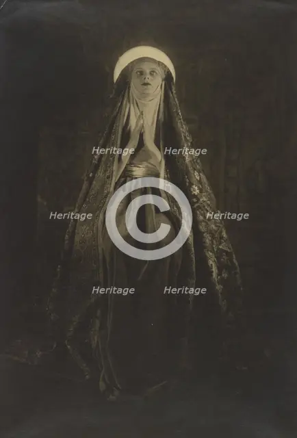 Portrait of a Woman Wearing a Long, Veiled Hat, about 1922. Creator: Francis Joseph Bruguiere.