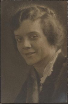 Portrait of a Woman Wearing Fur Trim, 1907-1943. Creator: Louis Fleckenstein