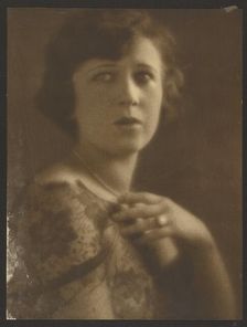 Portrait of a Woman Wearing Lace Top, 1907-1943. Creator: Louis Fleckenstein