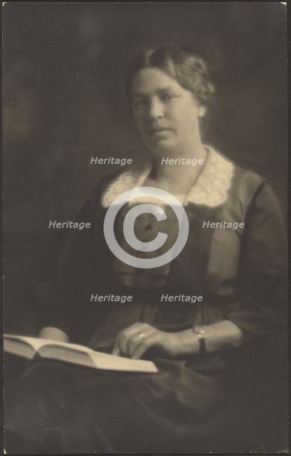 Portrait of a Woman with Open Book, 1907-1943. Creator: Louis Fleckenstein.