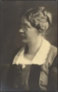 Portrait of a Woman with Open Book (cropped), 1907-1943. Creator: Louis Fleckenstein