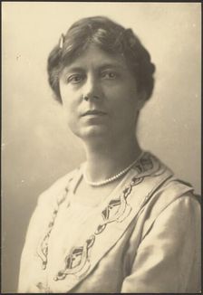 Portrait of a Woman with Applique Collar, 1907-1943. Creator: Louis Fleckenstein